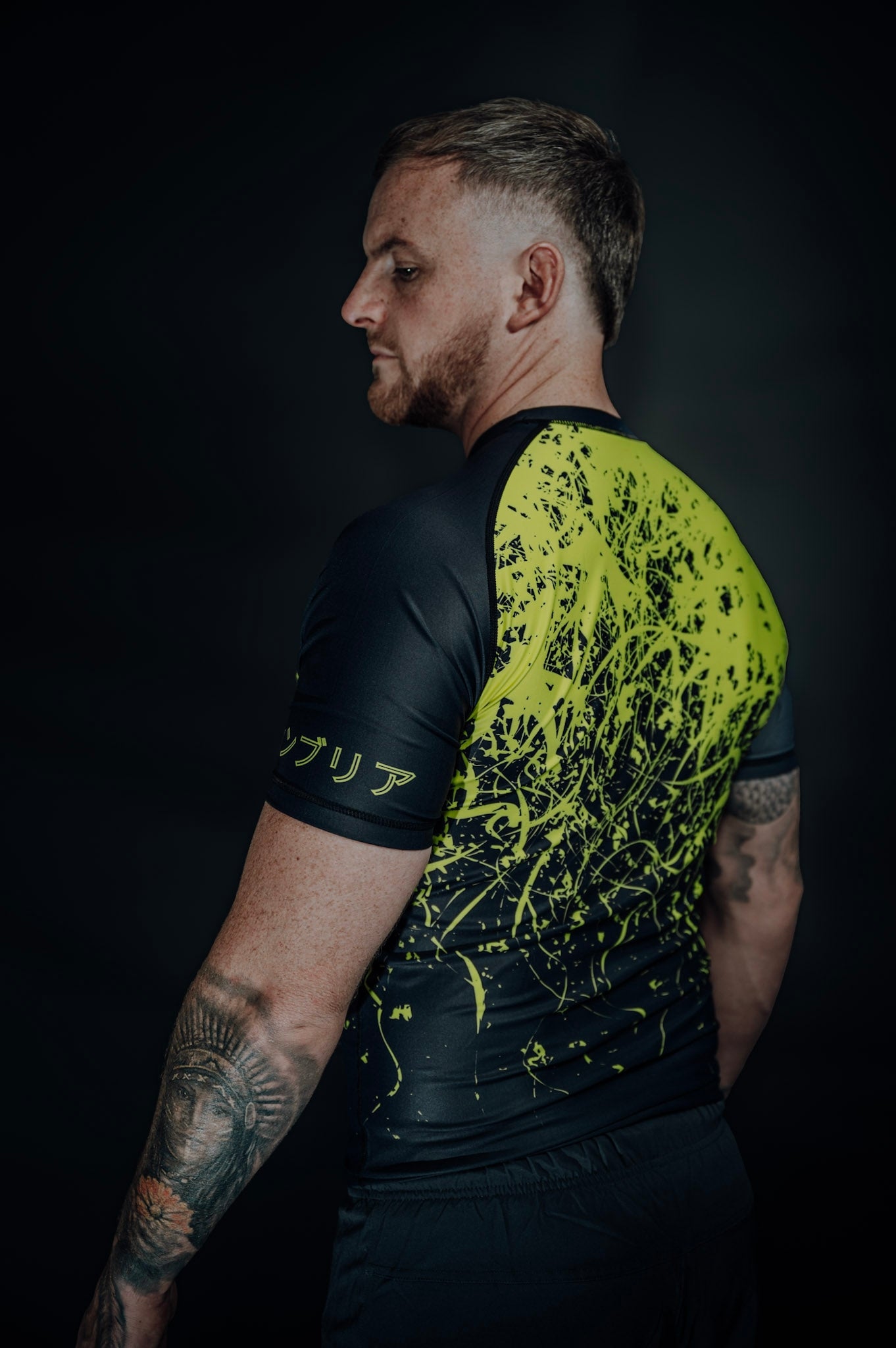Cambria BJJ neon yellow and black rashguard for Brazilian Jiu-Jitsu, compression top with modern splatter design for training and competition